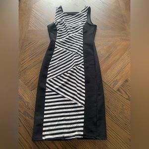 Black & white, form fitting dress.